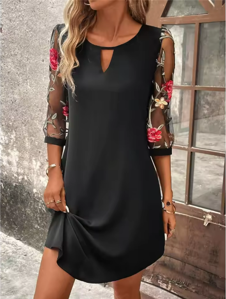 Elegant women's black V-neck dress with sheer floral print long sleeves, perfect for party or spring occasions.