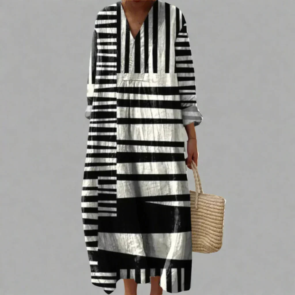 Elegant women's black & white linework striped V-neck midi dress, perfect for sophisticated or casual wear.