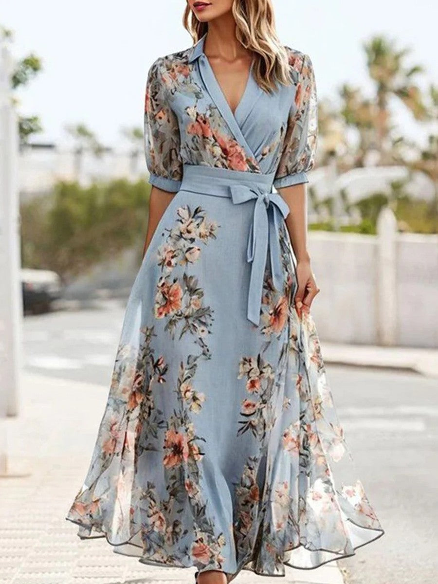 Elegant women's blue floral wrap maxi dress with puff sleeves, perfect for wedding guests, summer parties & events.