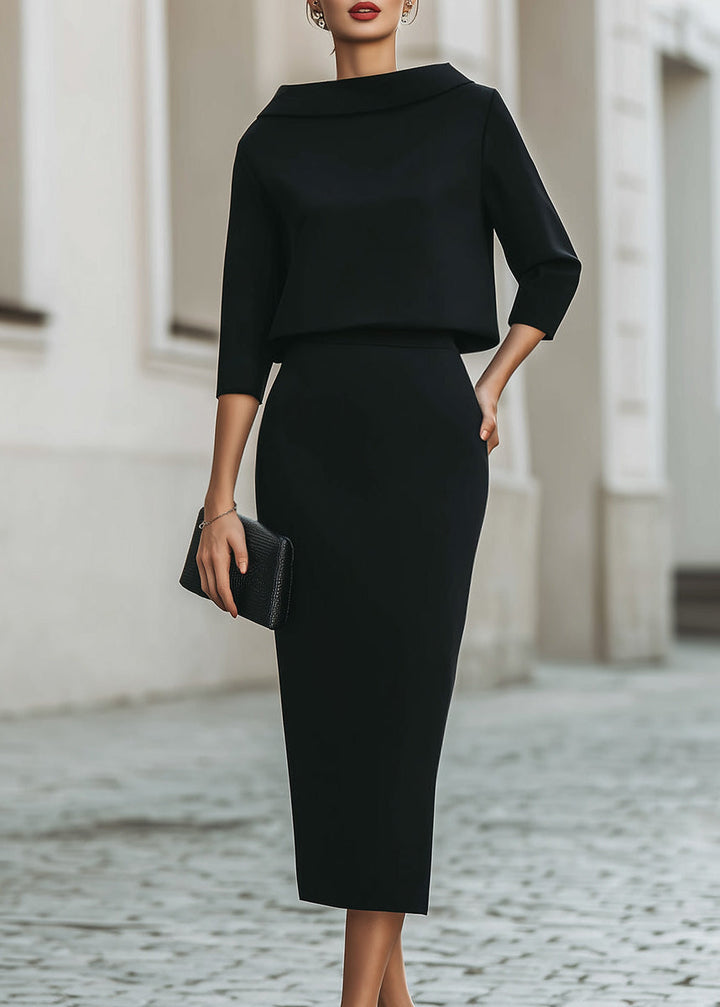 Sophisticated black boat neck midi skirt & 3/4 sleeve top, ideal for professional women.