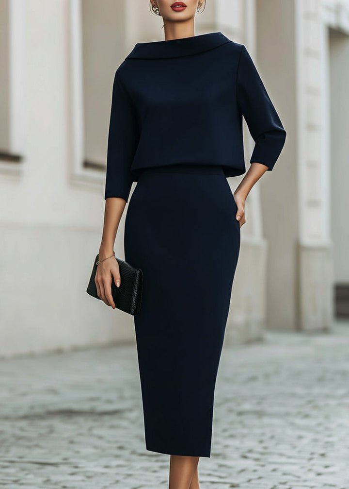 Formal women's matching set: elegant boat neck top and midi skirt with 3/4 sleeves.