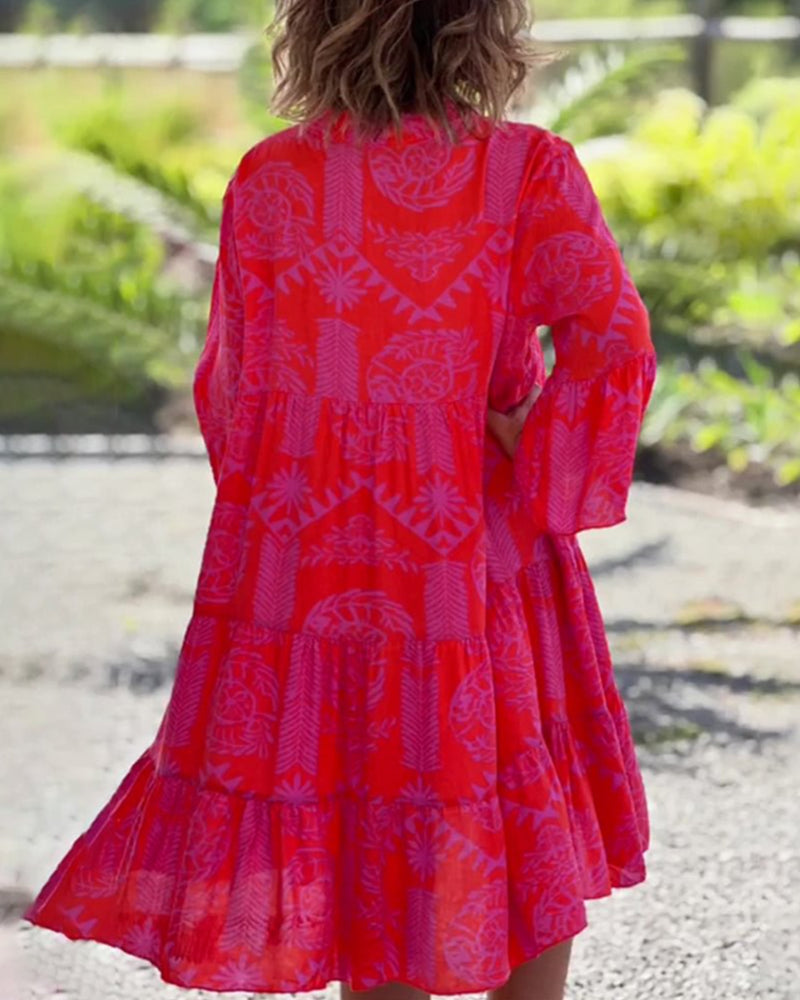 Chic women's boho midi dress. Elegant flowy design for summer vacation or casual spring wear.