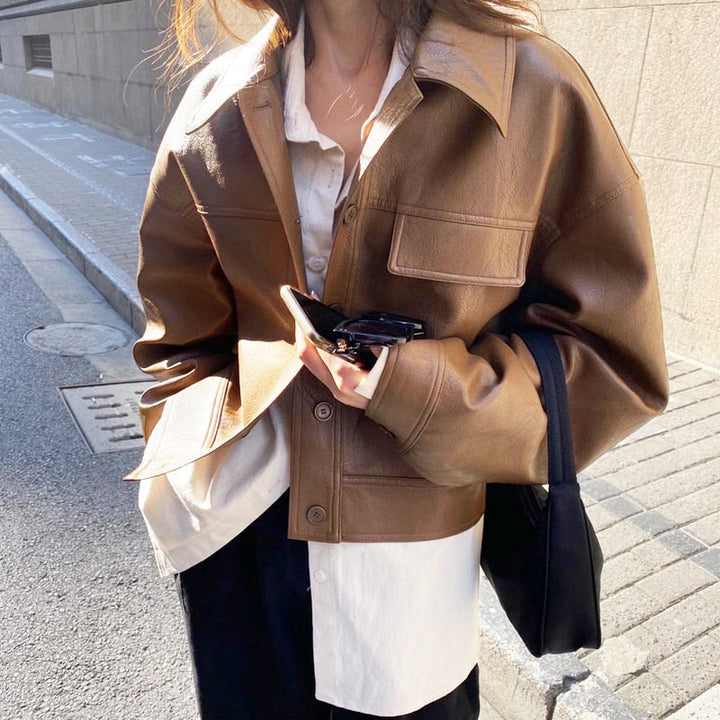 Women's tailored brown zip-up jacket, perfect for versatile and elegant casual fashion.