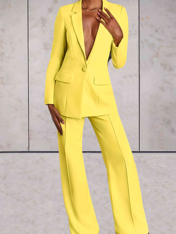 Elegant women's business blazer & wide-leg pants set. Perfect professional office wear for a chic, formal look.