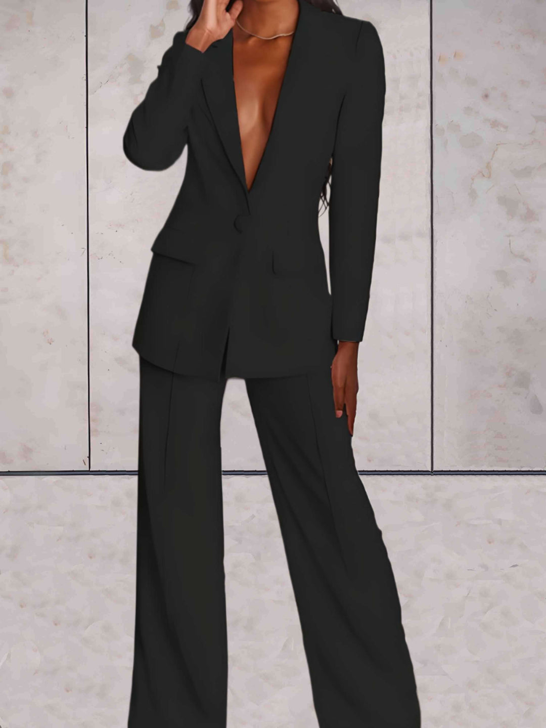Flowing wide-leg pants from the women's Emilia business suit, offering comfortable yet elegant formal office attire.