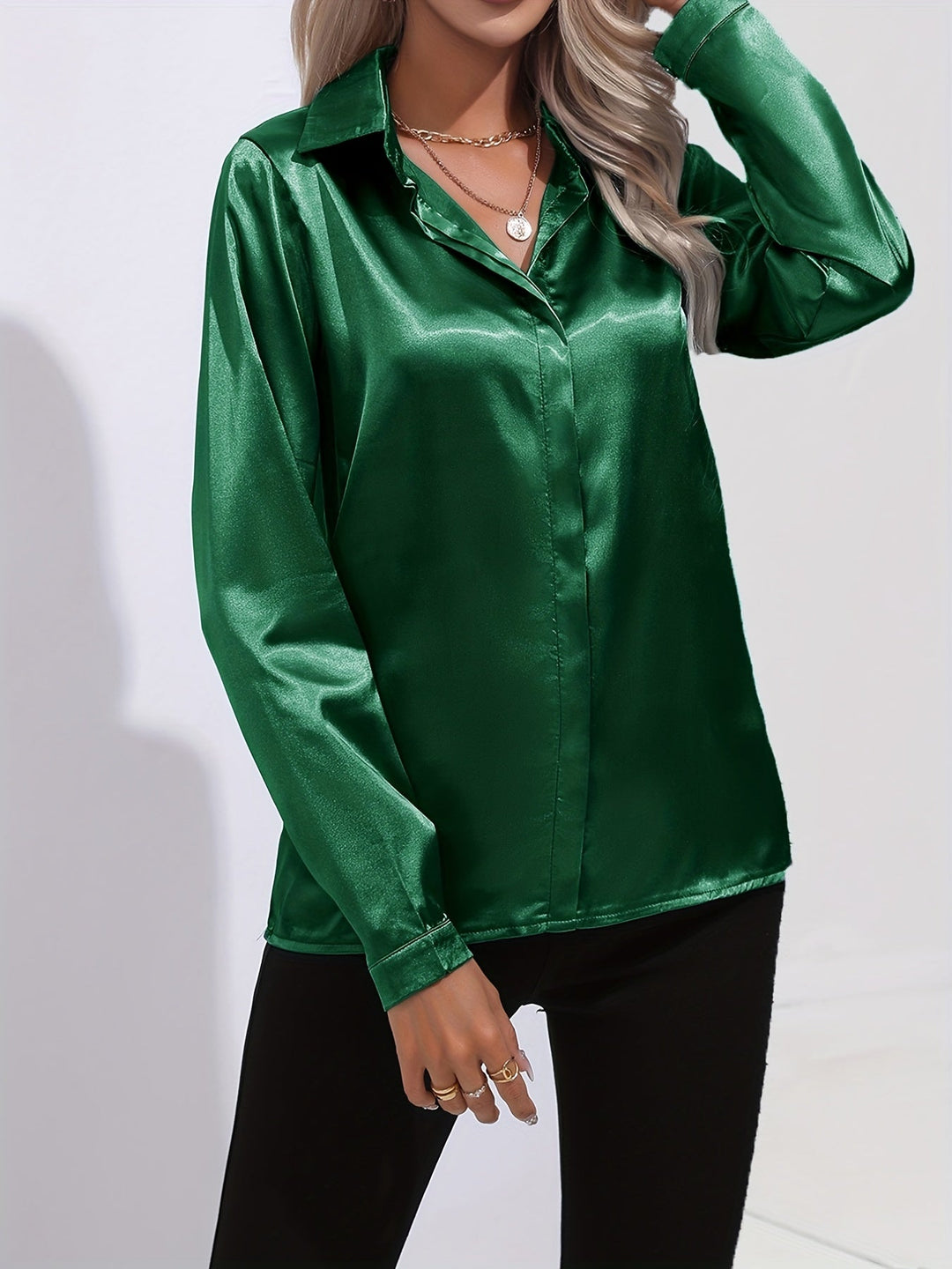 Women's elegant silver-grey satin long-sleeve button-down blouse, perfect for an understated refined appearance.
