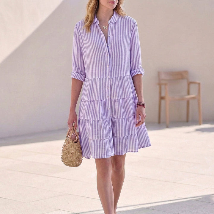 Casual women's V-neck mini shirt dress, ideal for summer and spring, with button-down front and tiered design.