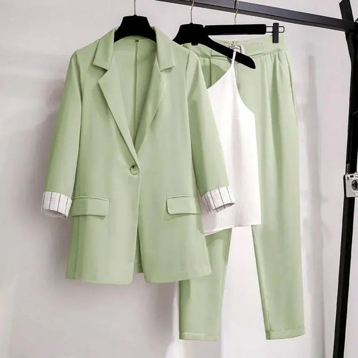 Close-up of a sophisticated women's chic coordinated suit set, highlighting fabric and elegant design.
