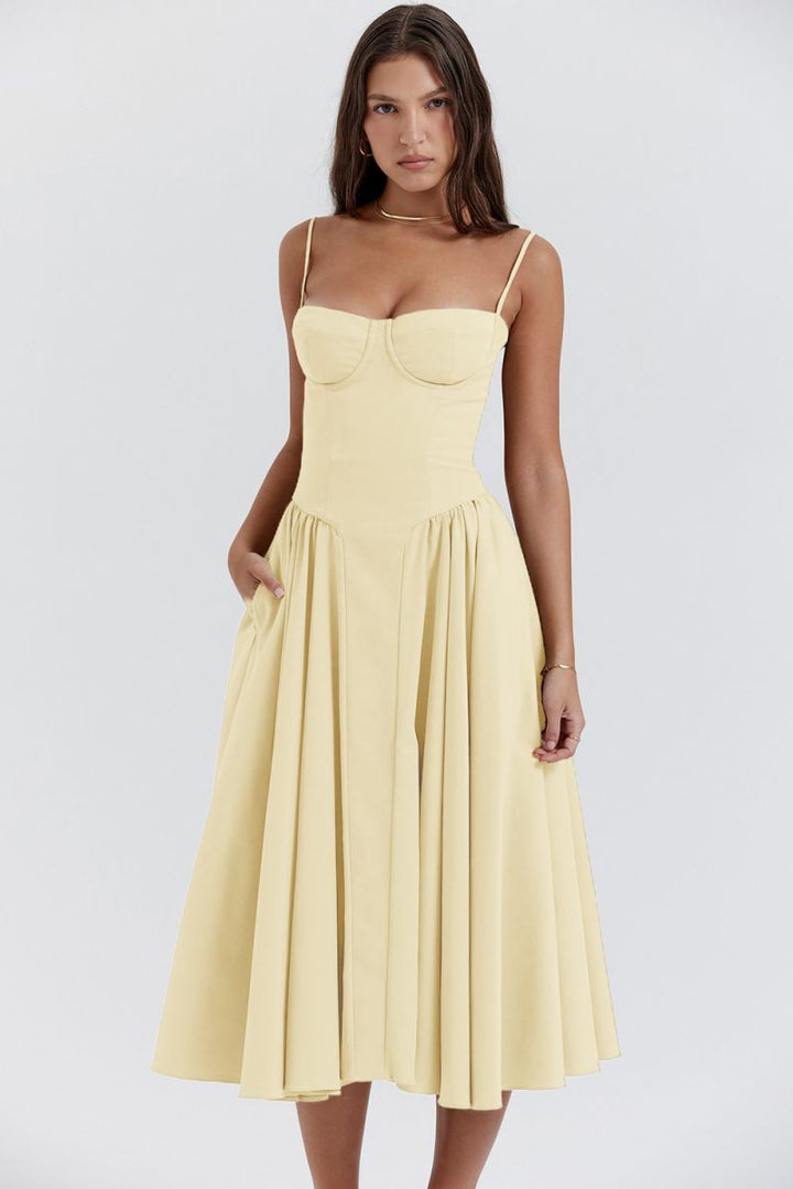 Elegant women's chic corset midi dress, perfect A-line wedding guest attire with sweetheart neckline.