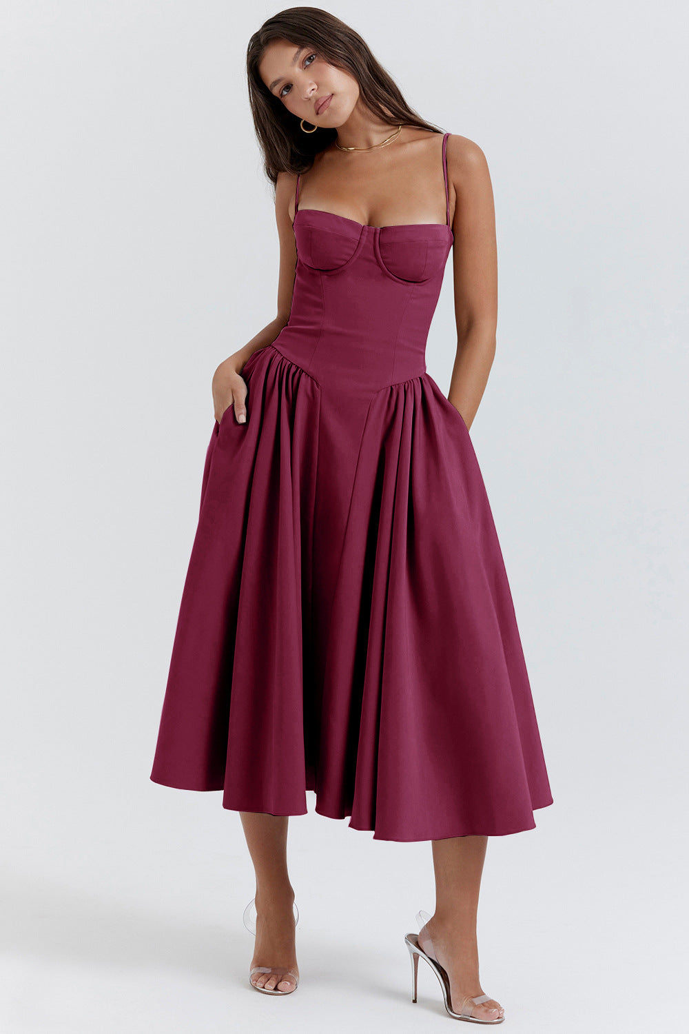 Formal women's wedding guest dress. Chic A-line midi with corset detail, perfect for elegant summer occasions.