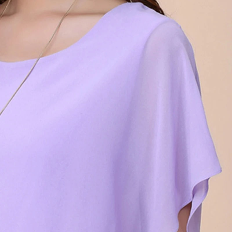 Timeless women's chiffon blouse, featuring elegant ruffled sleeves for a sophisticated look.