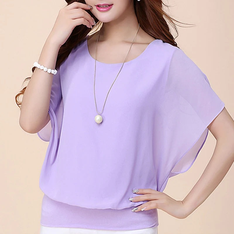 Sophisticated women's top with delicate ruffled sleeves, an elegant and feminine blouse.