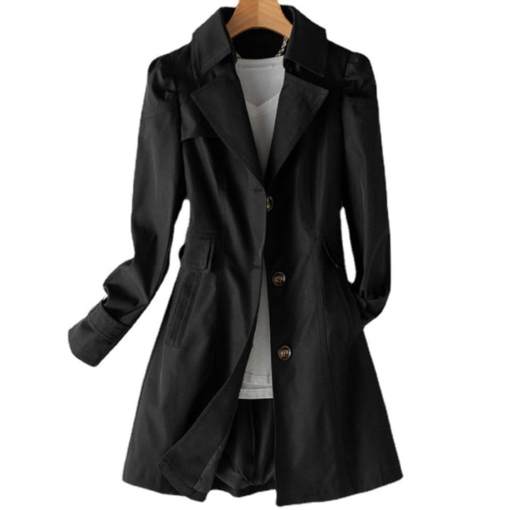 Elegant women's classic double-breasted trench coat in beige, perfect for spring and fall outerwear.