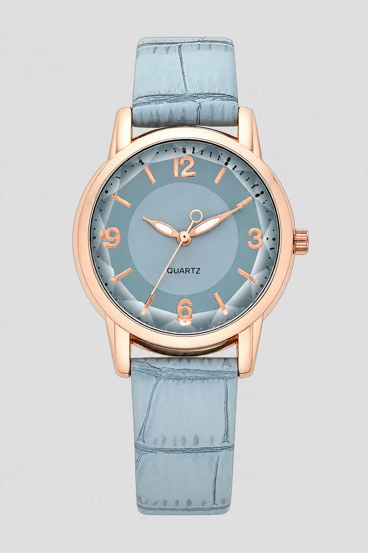 Versatile women's classic watch with a minimalist aesthetic and a unique embossed strap, suitable for any occasion.