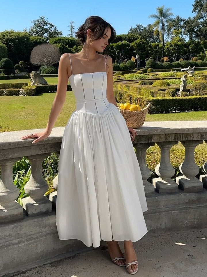 Elegant women's corset midi wedding guest dress, perfect for formal occasions and evening wear.
