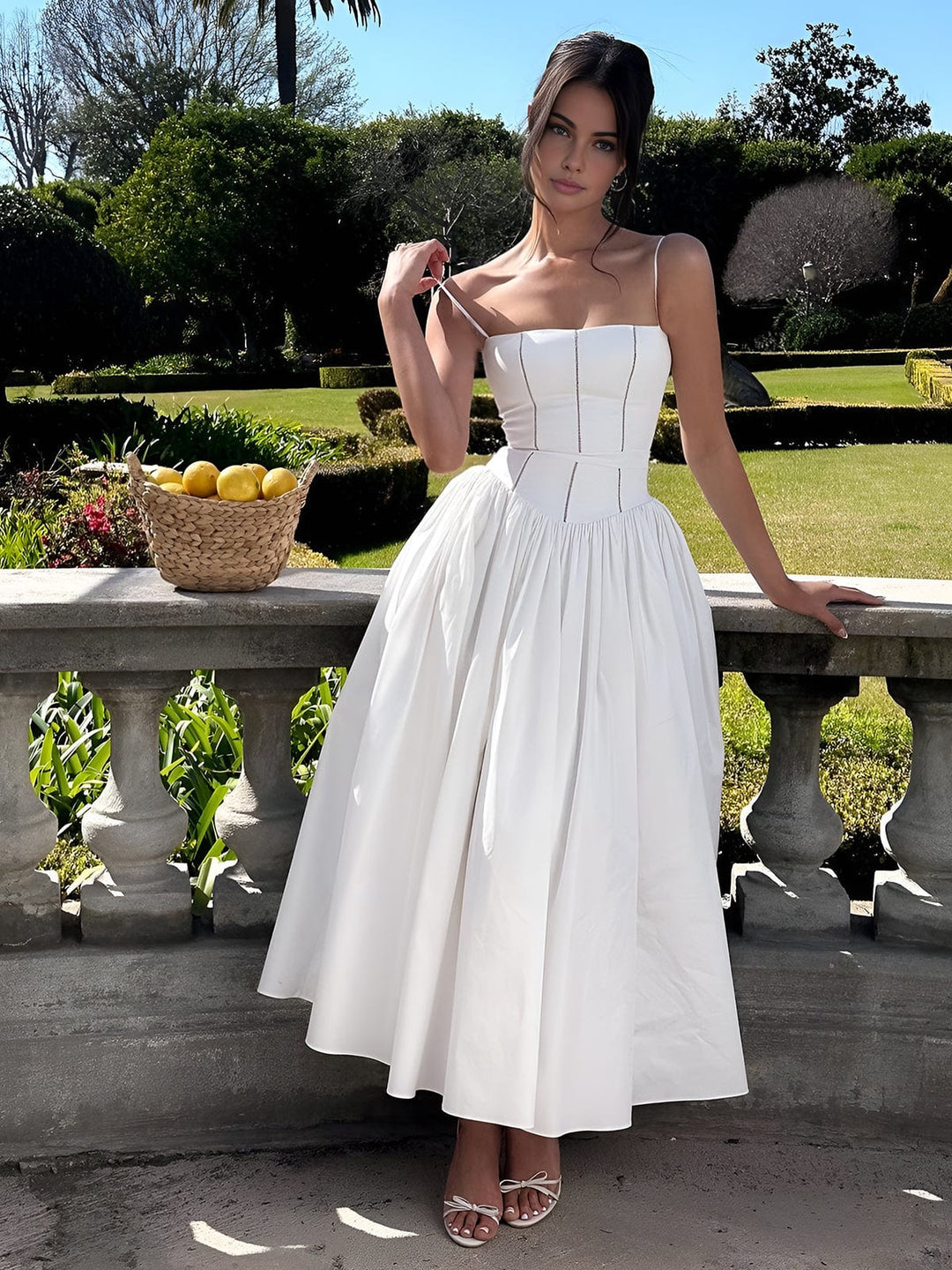Formal women's wedding guest midi dress with corset detailing, suitable for elegant events.