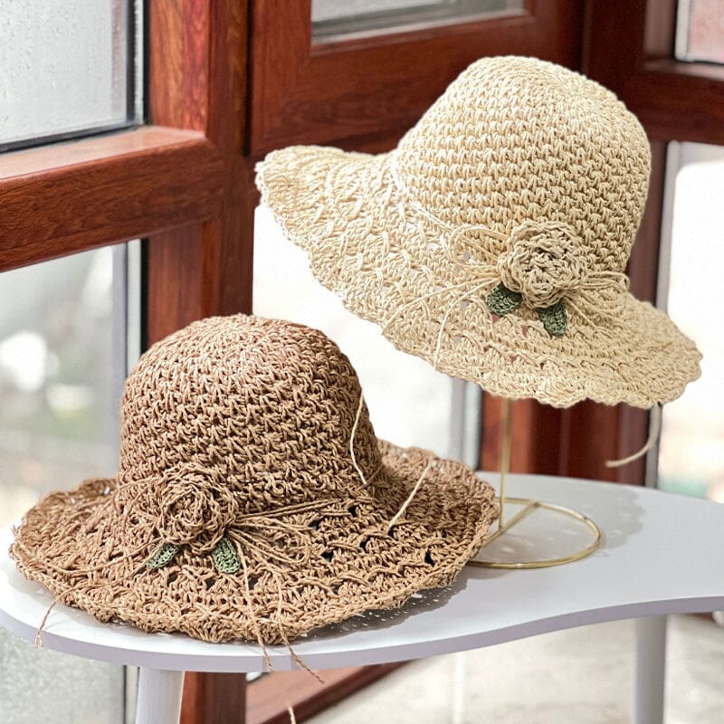 Crochet straw sun hat for women, designed with an elegant ruffle, an ideal summer accessory.