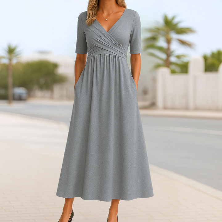 Women's everyday wear midi dress: stylish crossed V-neck, short sleeves, and comfortable flared skirt design.