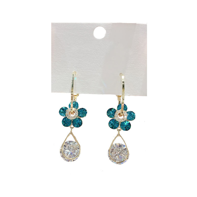 Elegant crystal flower earrings, designed to catch the light and enhance women's beauty