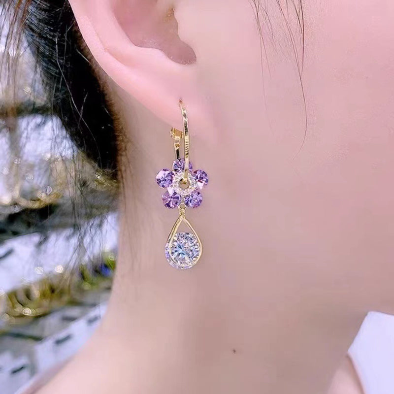 Sparkling crystal flower stud earrings for women, adding a touch of elegance to any outfit