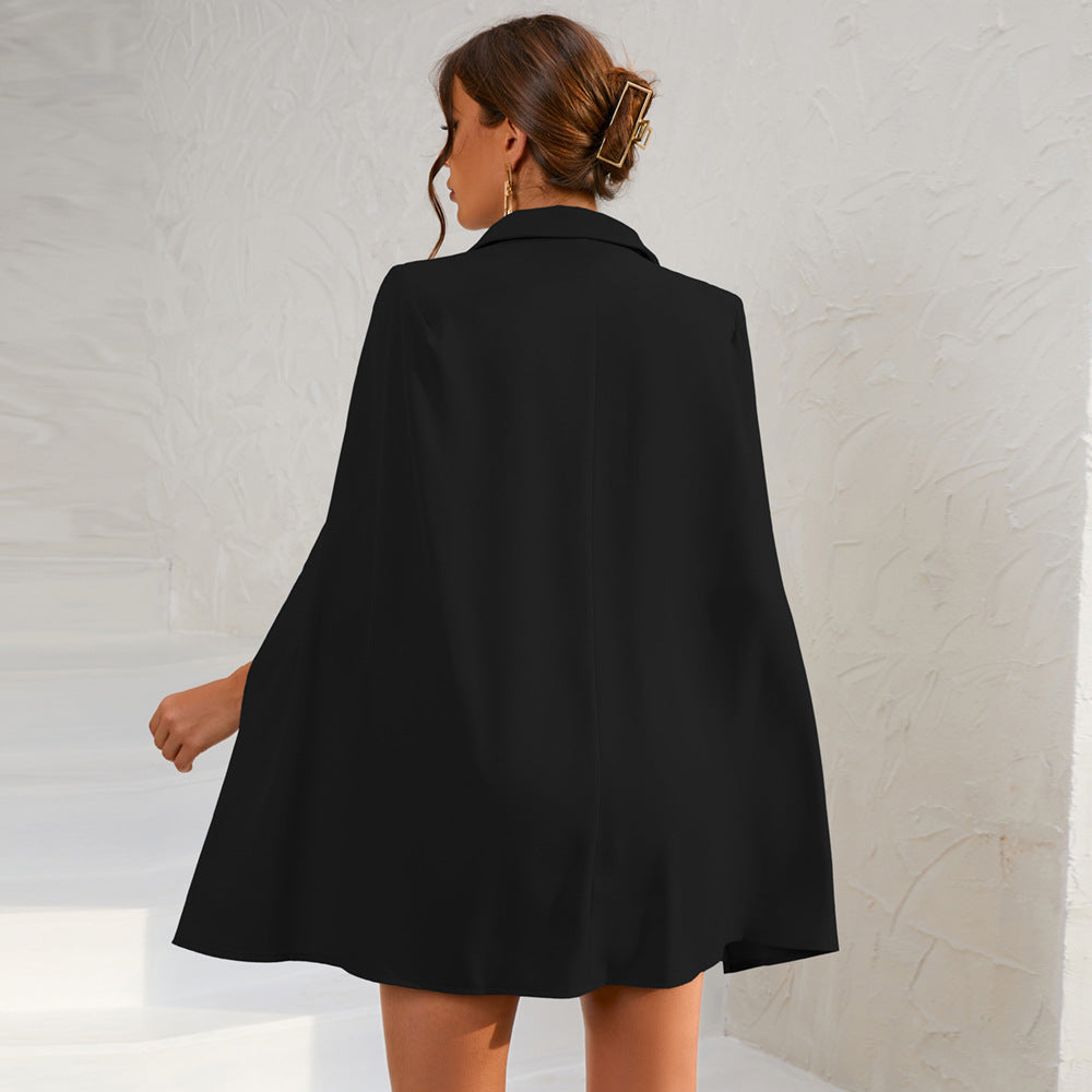 Sophisticated women's occasion dress: double-breasted cape style with an included belt