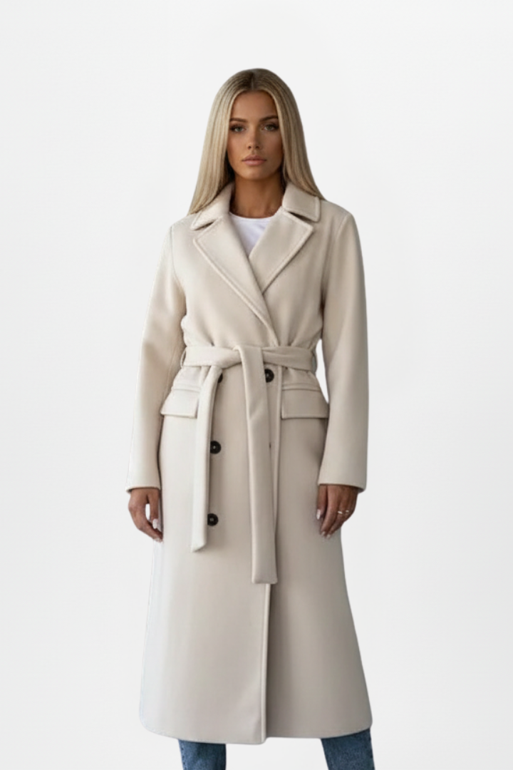 Women's long belted coat, double-breasted design. Sophisticated outerwear for elegant fall & winter style.