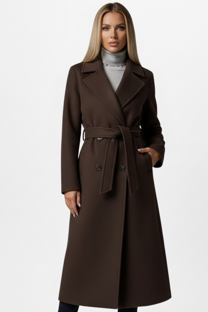 Women's classic trench coat style. Elegant double-breasted long coat with a flattering belt for winter.