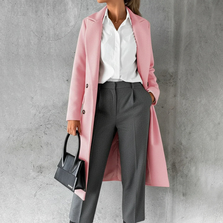 Chic women's elegant long winter coat featuring double-breasted style. Perfect warm, sophisticated fall outerwear.