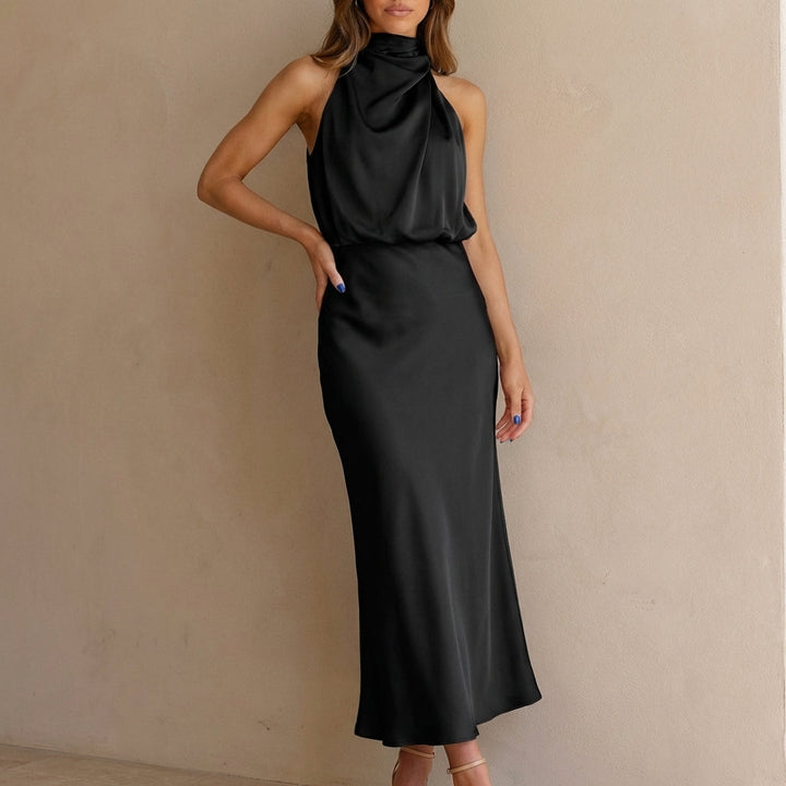 Sleeveless draped halter neck midi dress for women, ideal for evening wear, cocktails, and formal events.