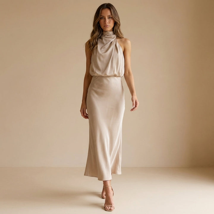 Women's blouson waist midi dress, with a draped halter neck, ideal for evening, cocktail, and formal wear.