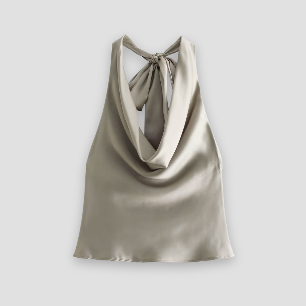 Rear view of an elegant women's halter satin tank top, showcasing the open back design and drape.