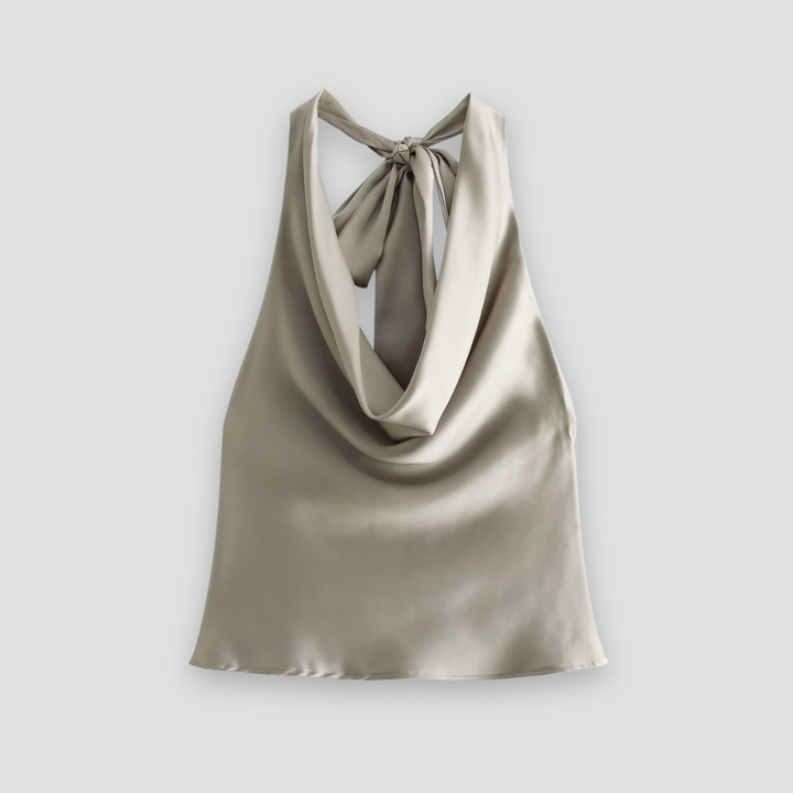 Rear view of an elegant women's halter satin tank top, showcasing the open back design and drape.