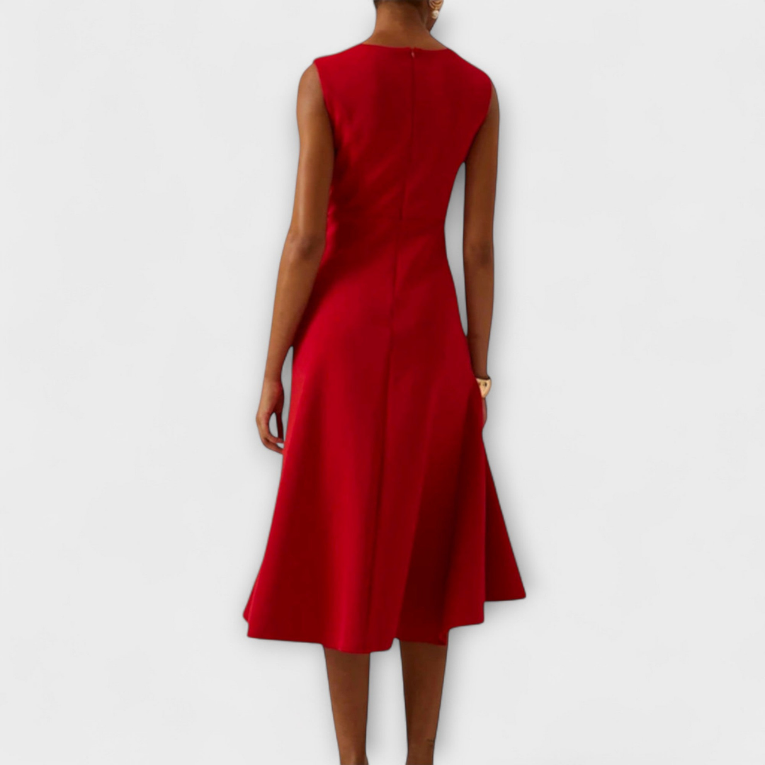 Stylish women's midi dress featuring a draped design & ruffle hem, ideal for elegant occasions & parties.