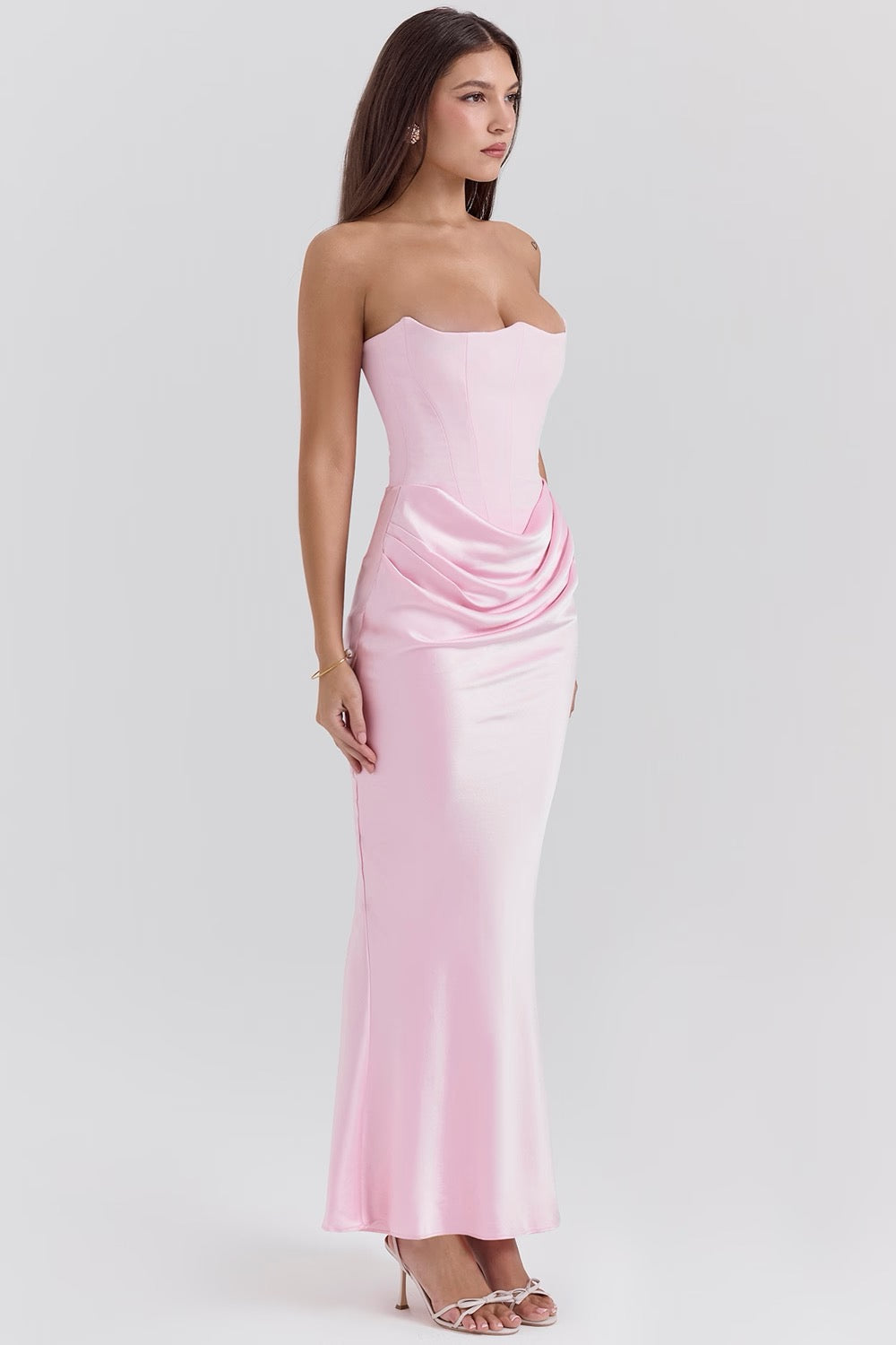 Formal strapless prom dress with elegant draping and a sophisticated silhouette.