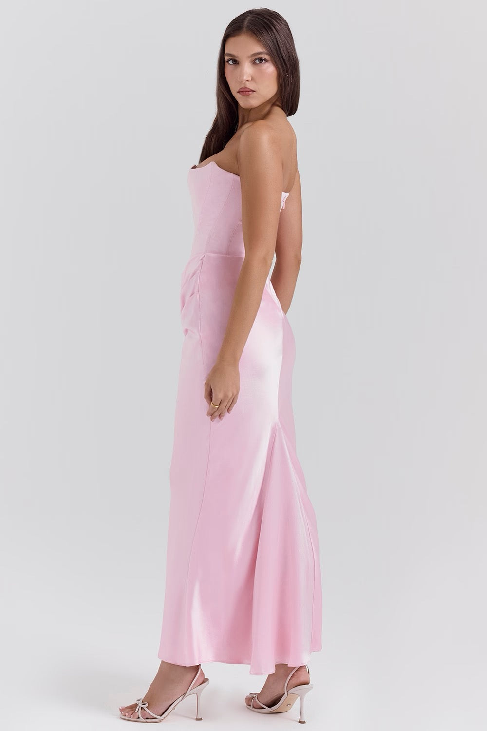 Stunning sweetheart strapless homecoming dress with beautiful draped details.