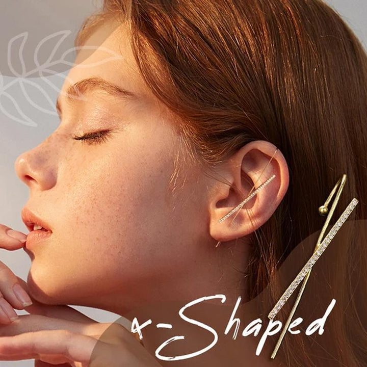 Hypoallergenic ear wrap crawler earring for women, delicate silver-tone with brilliant rhinestone accents. Front view.