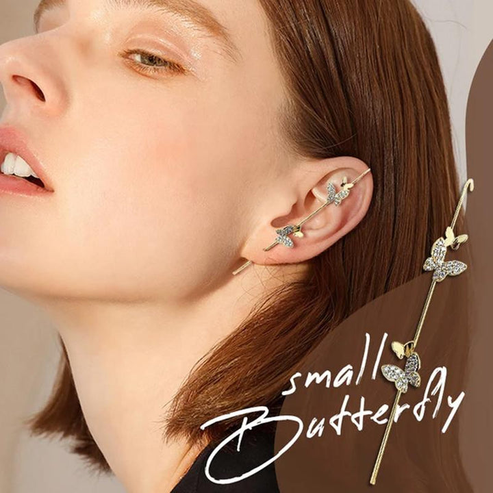 Women's rhinestone ear wrap crawler earring, a glamorous and comfortable hypoallergenic jewelry piece. Studio shot.
