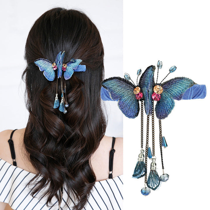 Elegant women's embroidered butterfly hair clip with rhinestones, perfect for party hair.