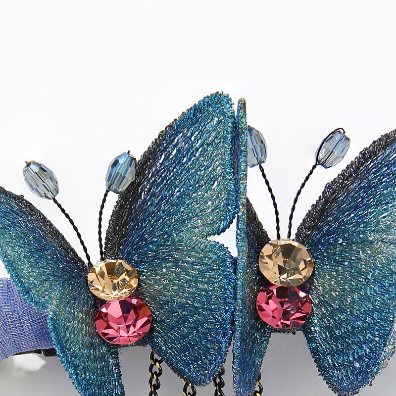Women's butterfly fringe hair clip, intricately embroidered with sparkling rhinestones, ideal for daily wear.