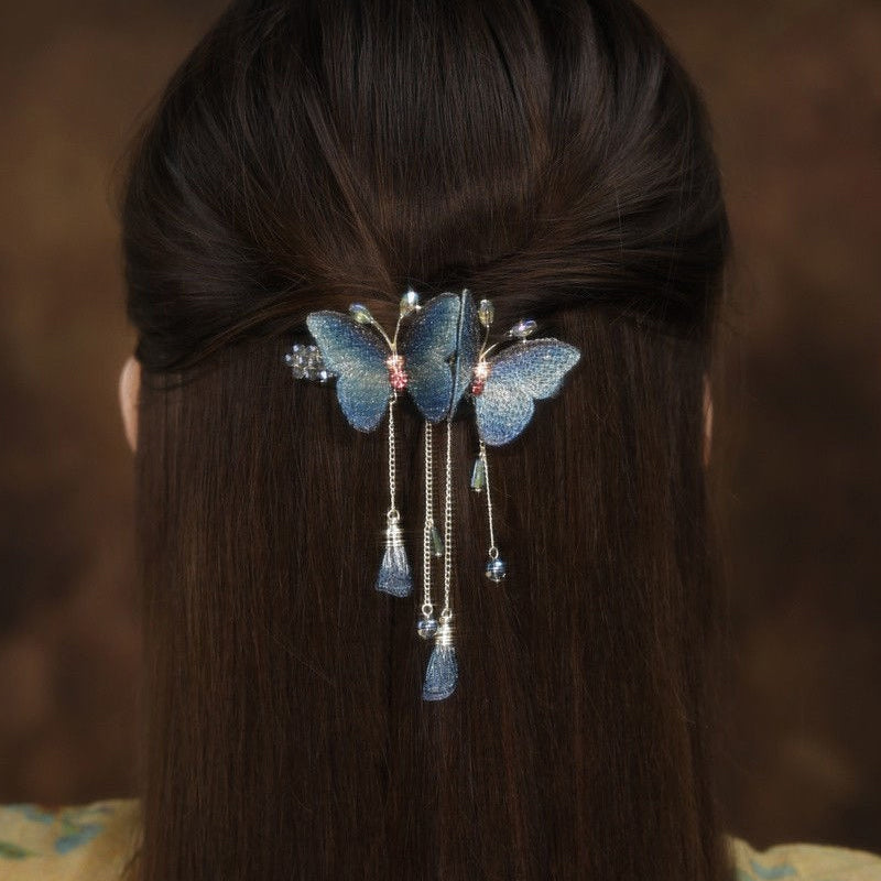 Graceful embroidered butterfly hair fringe clip, adorned with rhinestones, a chic women's accessory.