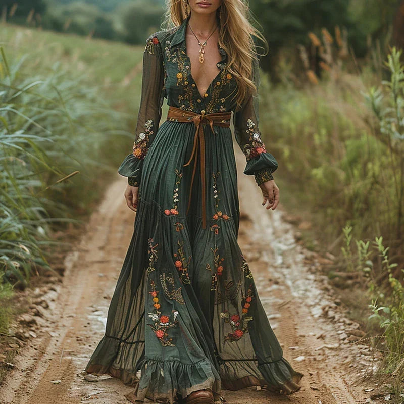 Full view of a woman wearing a modest long sleeve embroidered boho maxi dress, perfect for special occasions.