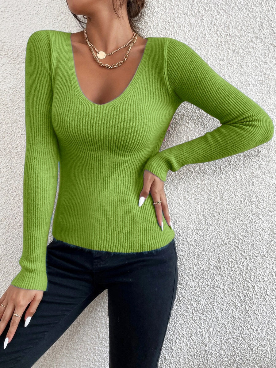 Elegant women's fine knit V-neck jumper. Slim fit, long sleeve sweater perfect for everyday wear & layering.
