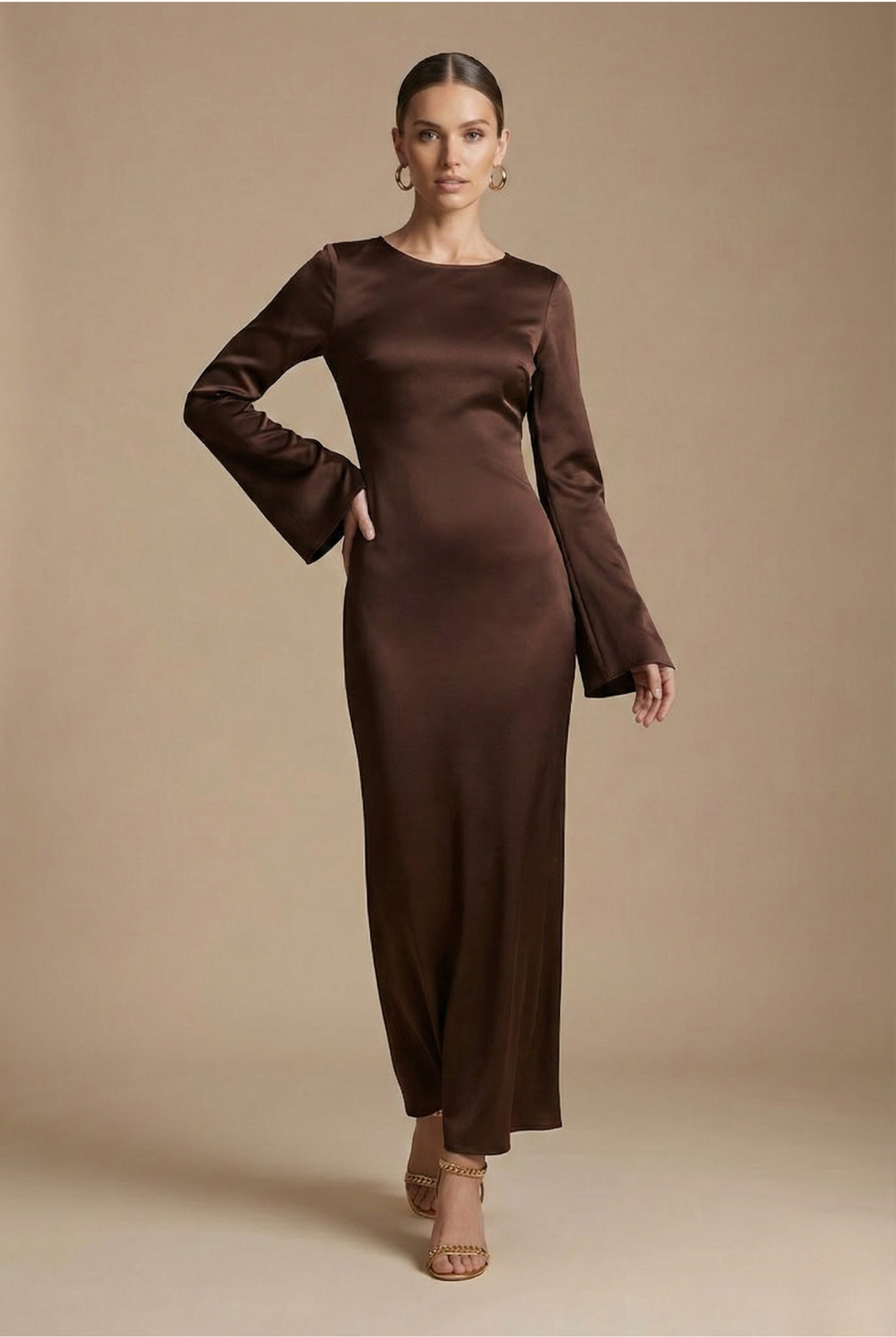Cream women's formal evening gown with chic flare sleeves and a sleek column silhouette.