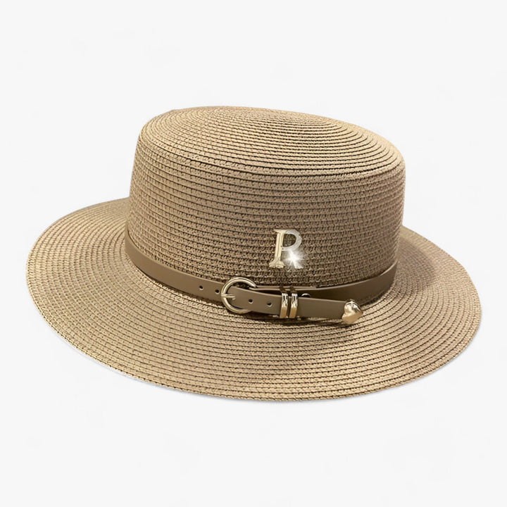 Elegant women's flat crown straw summer hat, perfect for beach trips or a chic fashion accessory.