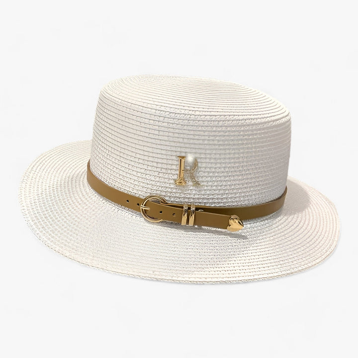 Chic women's straw sun hat with a flat crown, ideal for summer beach days and travel.