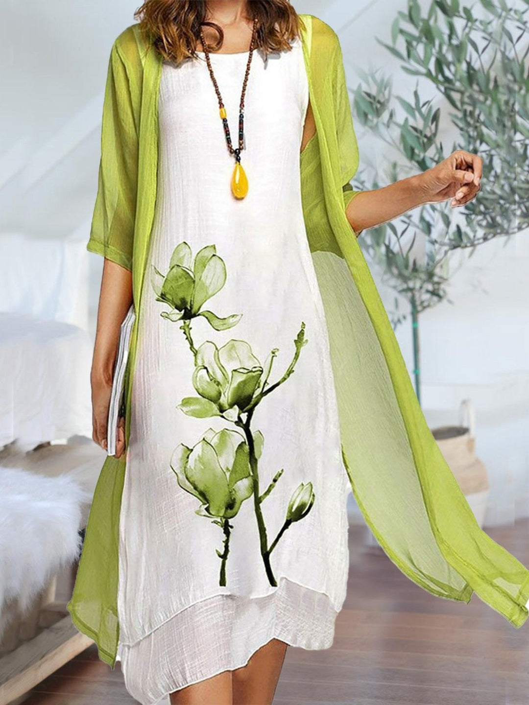Elegant women's floral 2-piece midi dress set with a sheer overlay cardigan, perfect for spring/summer style.