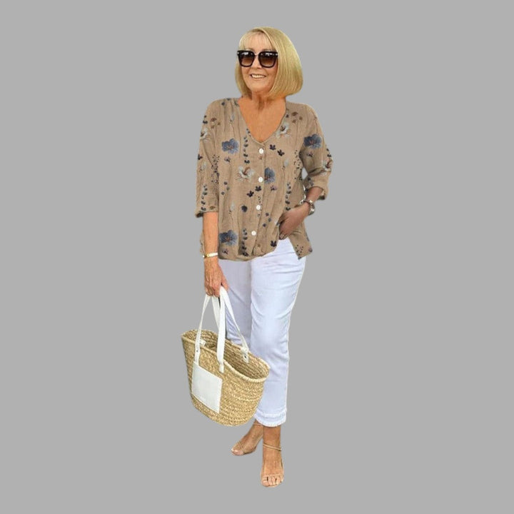 Stylish women's floral printed blouse, elegant long sleeve top, perfect for fashion-forward looks.