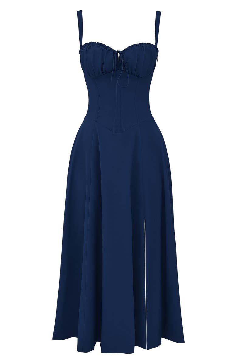 Flowing hemline of a women's floral midi dress, adding to its elegant silhouette