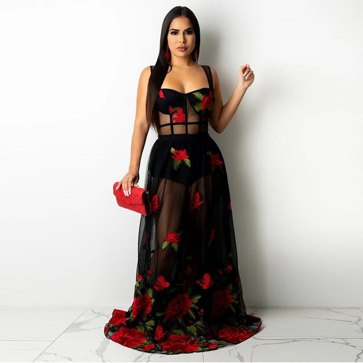 Elegant women's floral embroidery maxi dress with delicate spaghetti straps, perfect for summer parties.