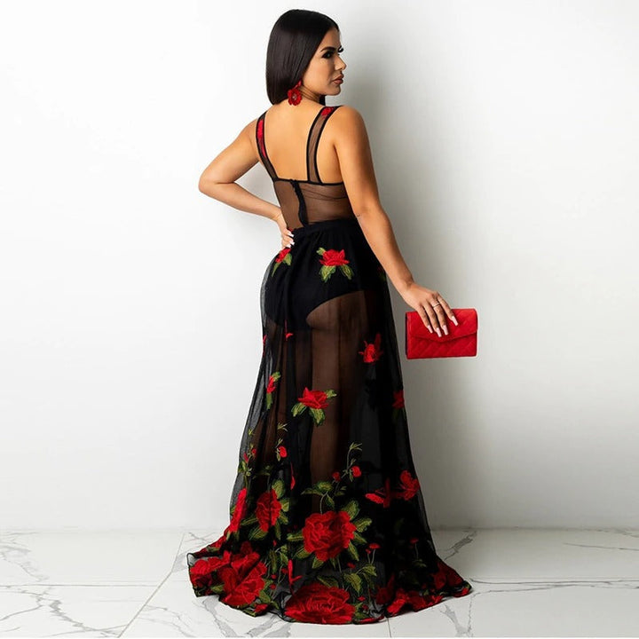 Close-up of romantic floral embroidery detail on a women's spaghetti strap maxi dress, ideal for occasion wear.